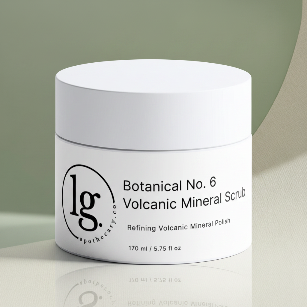 White jar of Botanical No. 6 | Volcanic Mineral Scrub with minimalist design on a light green and beige background, showcasing eco-conscious luxury botanical skincare by lg apothecary co.